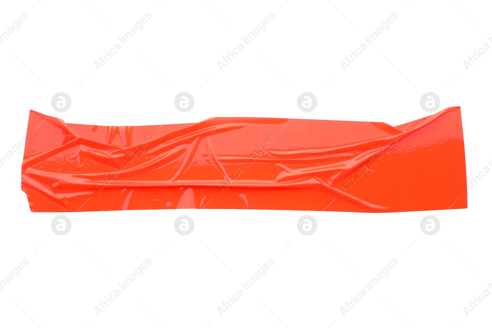 Photo of Strip of red adhesive tape on white background, top view