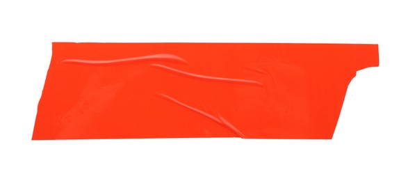 Photo of Strip of red adhesive tape on white background, top view