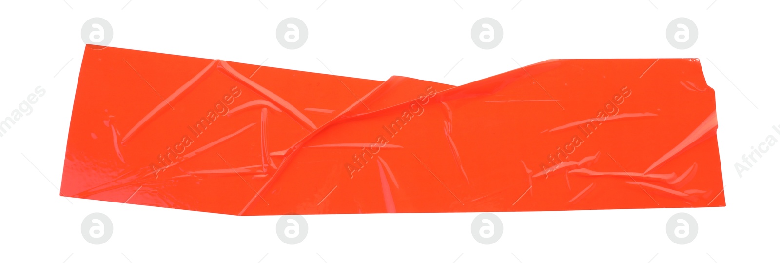 Photo of Strip of red adhesive tape on white background, top view