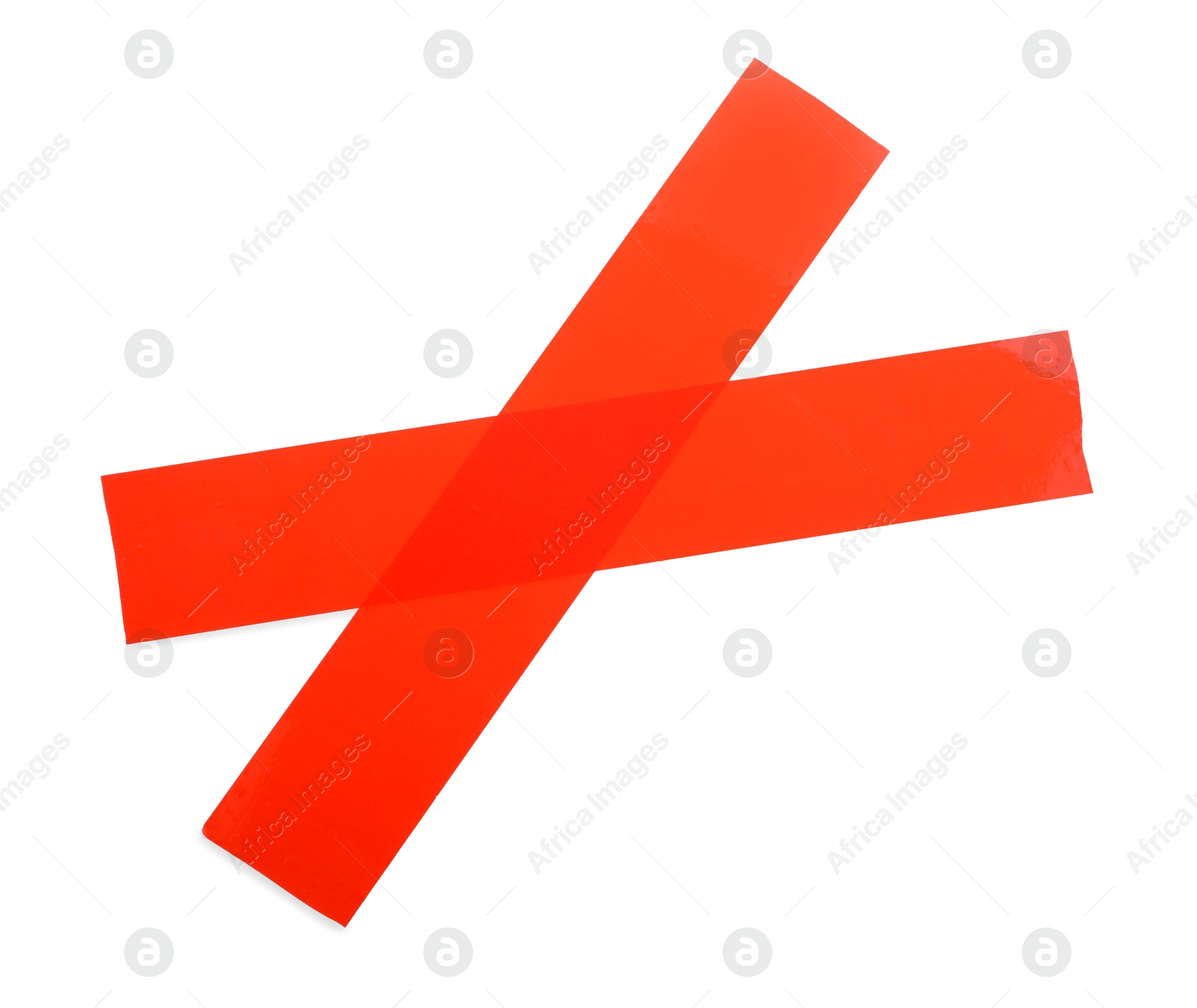 Photo of Cross made of red adhesive tape on white background, top view