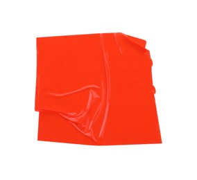 Photo of Strip of red adhesive tape on white background, top view