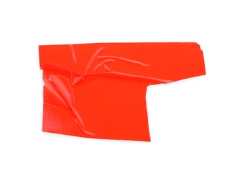 Photo of Strip of red adhesive tape on white background, top view