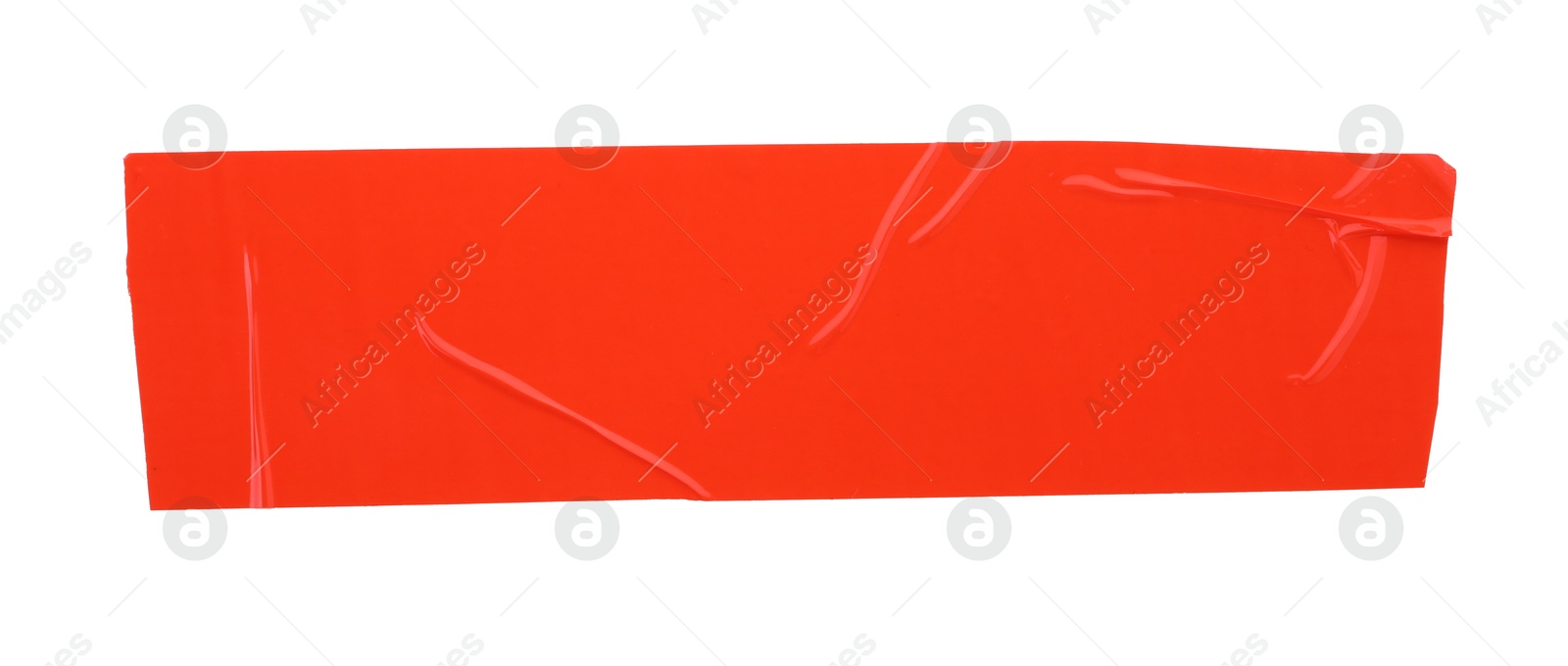 Photo of Strip of red adhesive tape on white background, top view