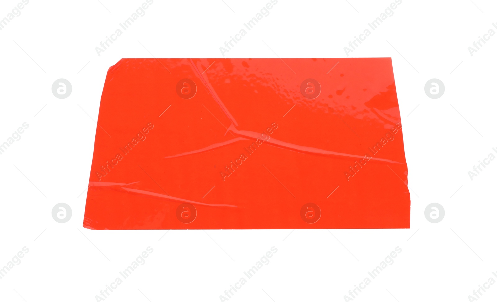 Photo of Strip of red adhesive tape on white background, top view