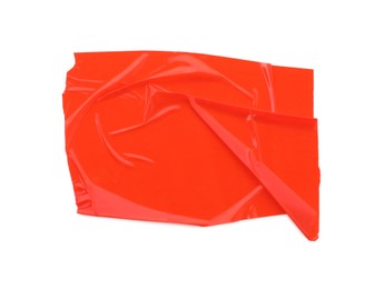 Photo of Strip of red adhesive tape on white background, top view