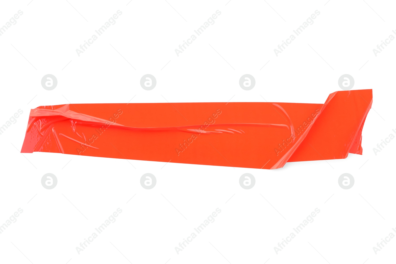 Photo of Strip of red adhesive tape on white background, top view