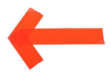 Photo of Arrow made of red adhesive tape on white background, top view