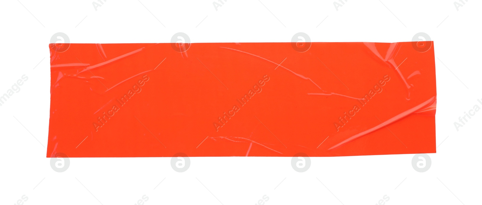 Photo of Strip of red adhesive tape on white background, top view