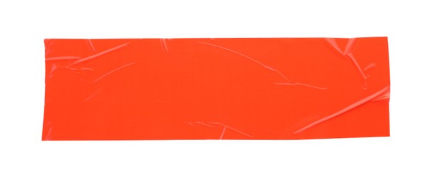 Photo of Strip of red adhesive tape on white background, top view