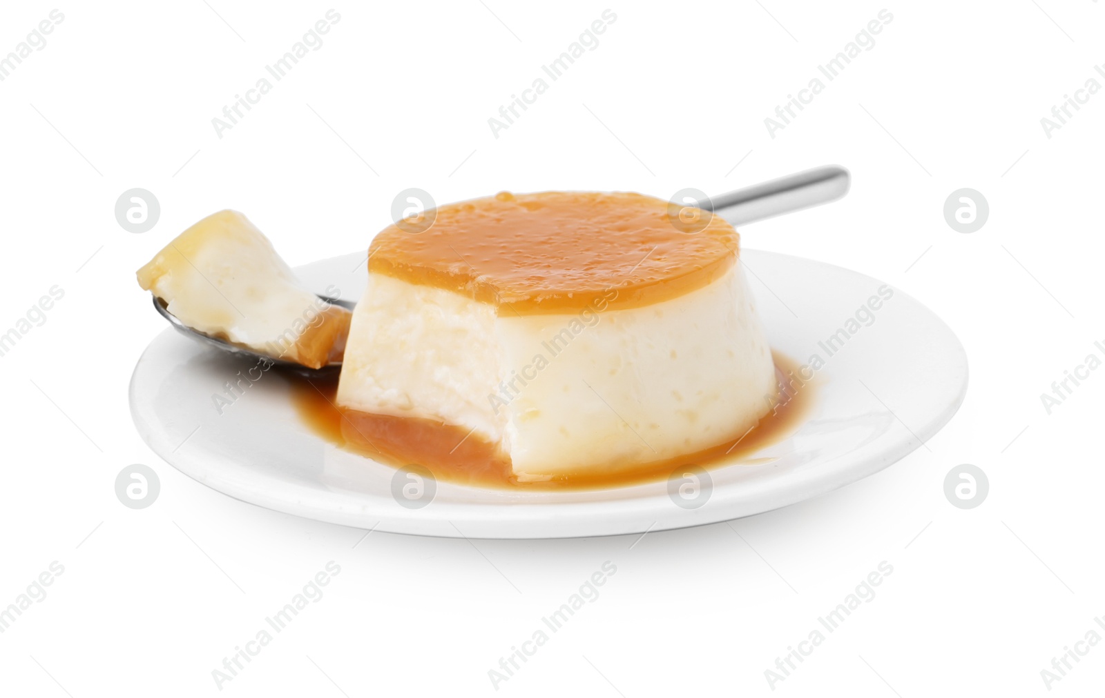 Photo of Tasty pudding with caramel sauce and spoon isolated on white