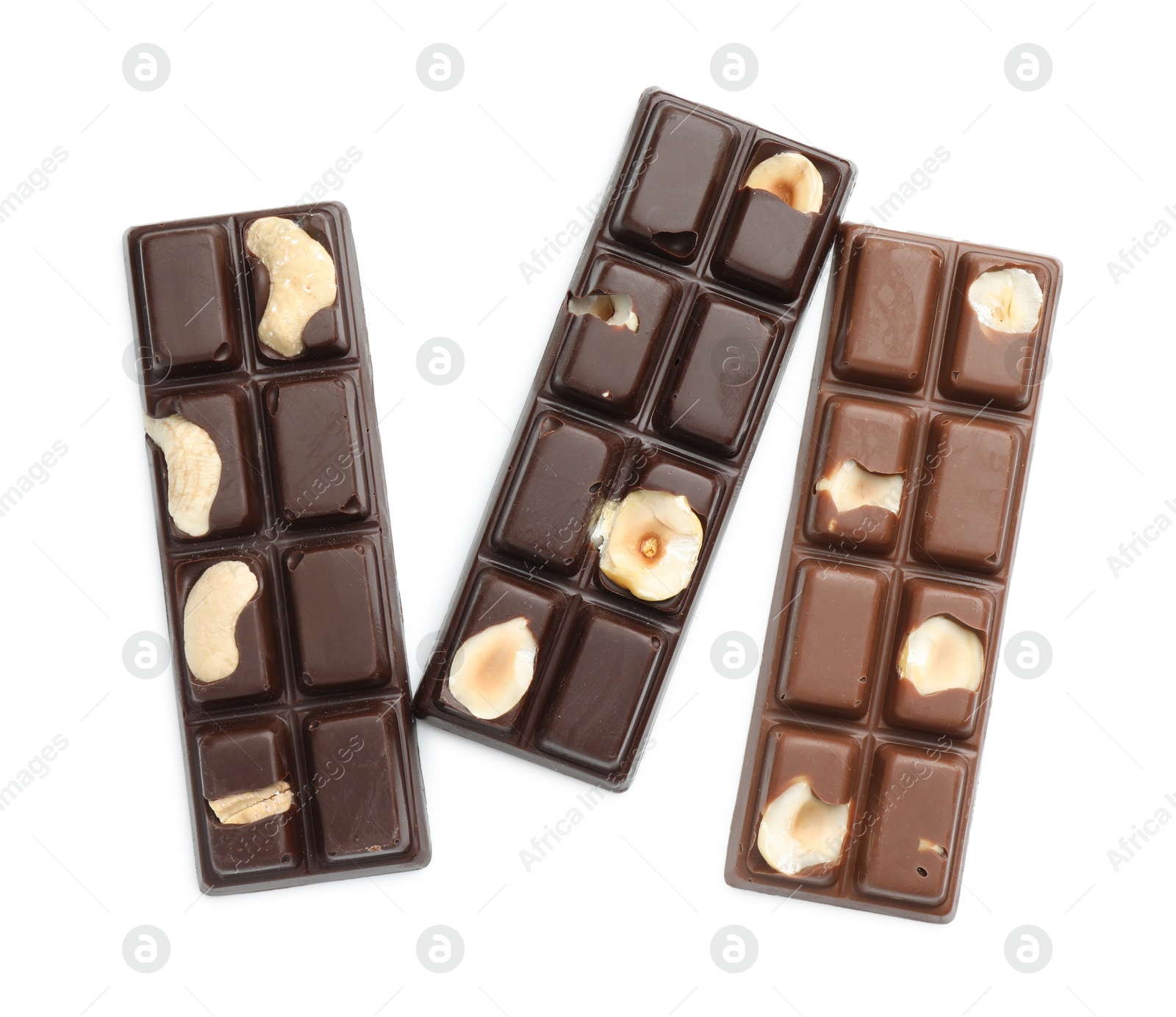 Photo of Tasty chocolate bars with nuts isolated on white, top view