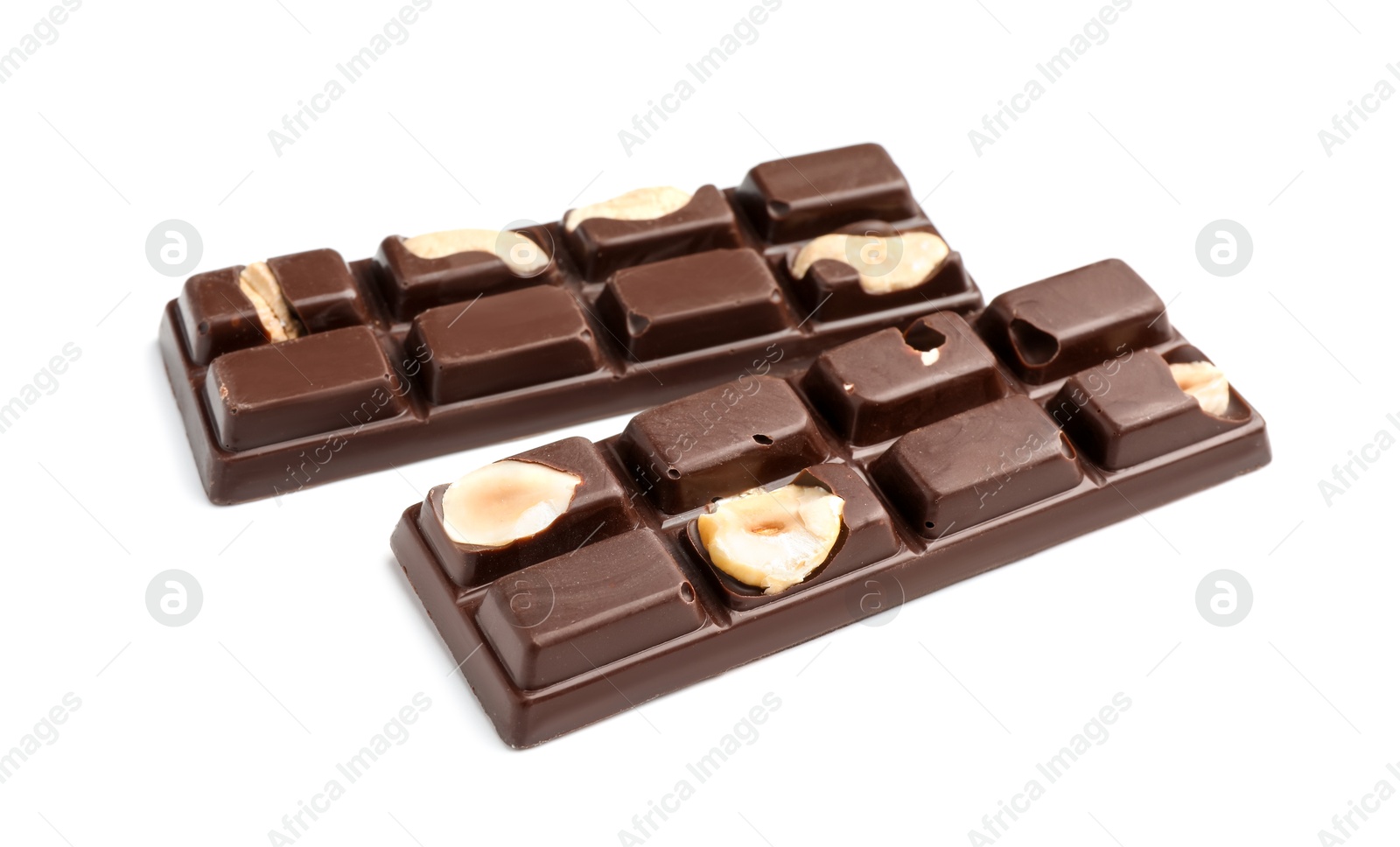 Photo of Tasty chocolate bars with nuts isolated on white