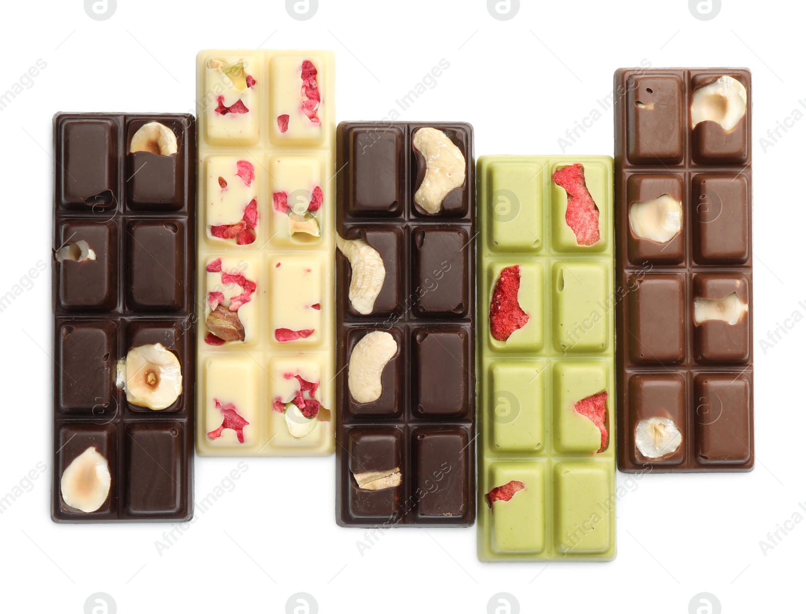 Photo of Different tasty chocolate bars isolated on white, top view