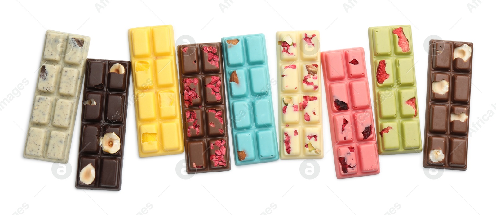 Photo of Different tasty chocolate bars isolated on white, top view