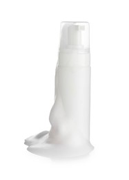 Photo of Bottle of cosmetic product with foam isolated on white