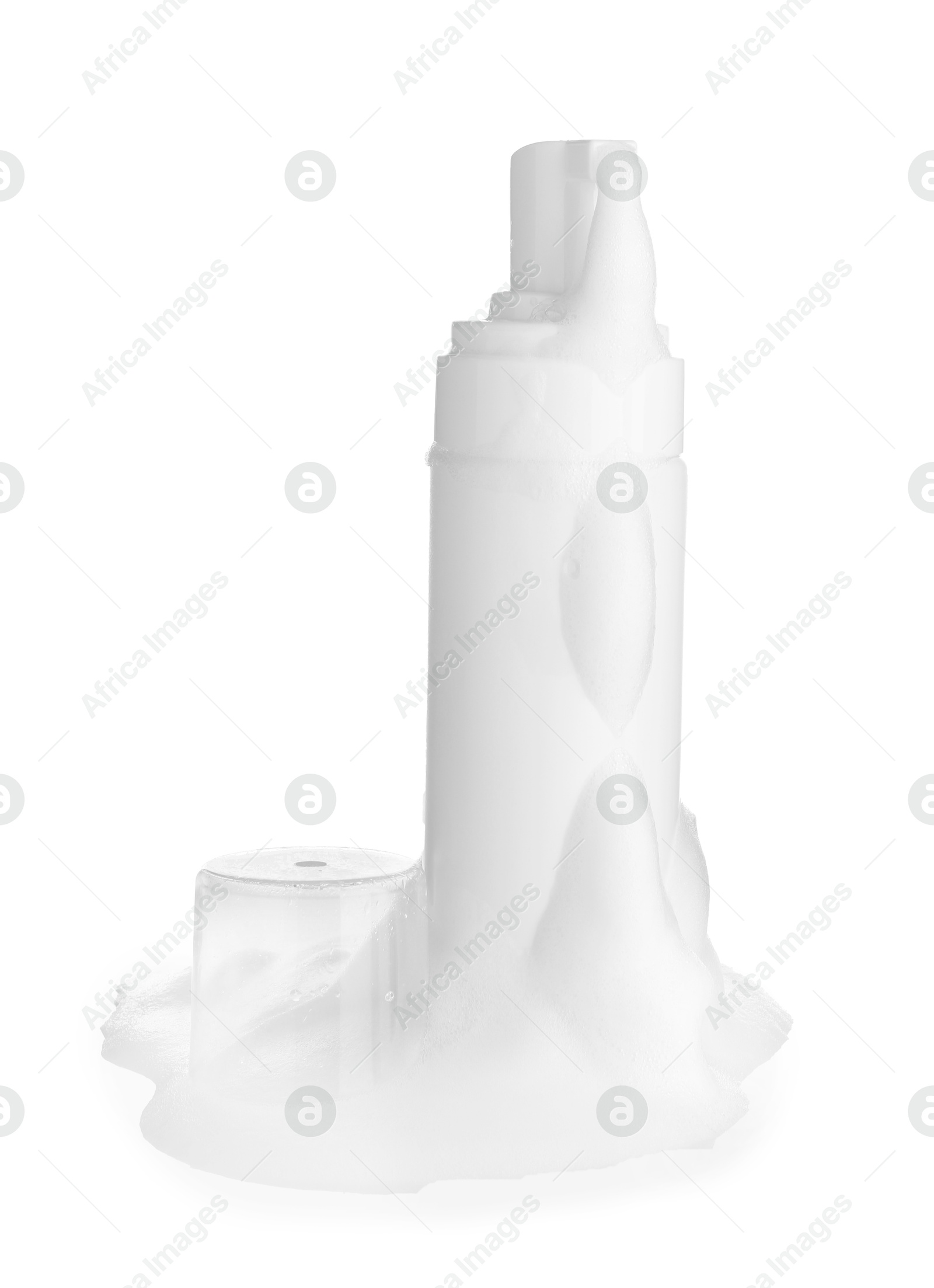 Photo of Bottle of cosmetic product with foam isolated on white