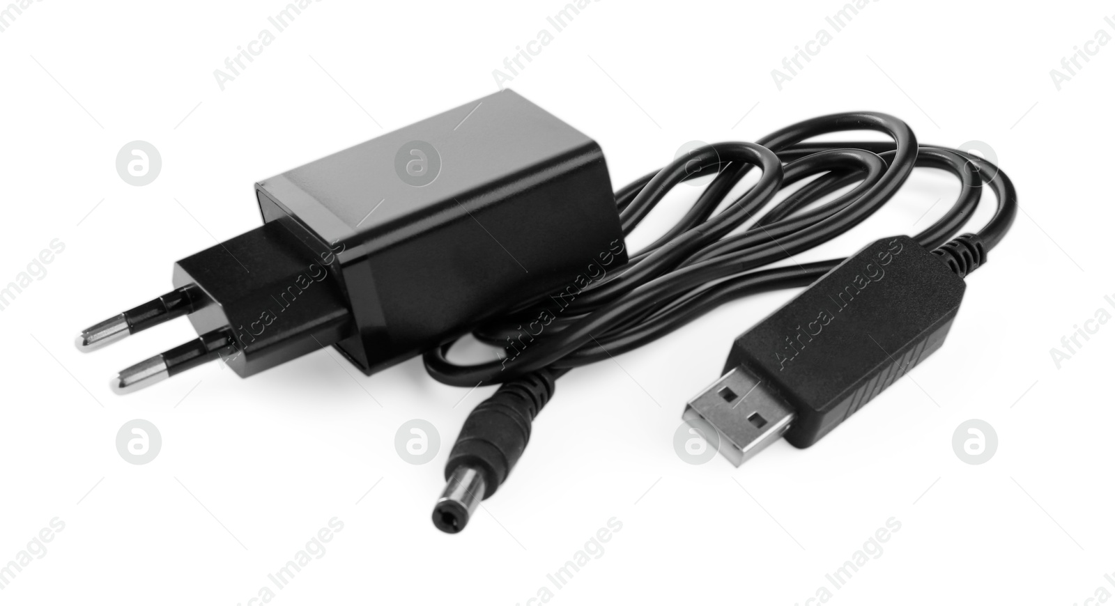 Photo of Black USB power adapter and charge cable isolated on white