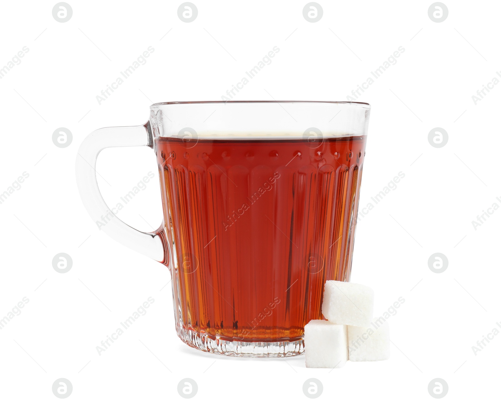 Photo of Refreshing black tea in cup and sugar cubes isolated on white