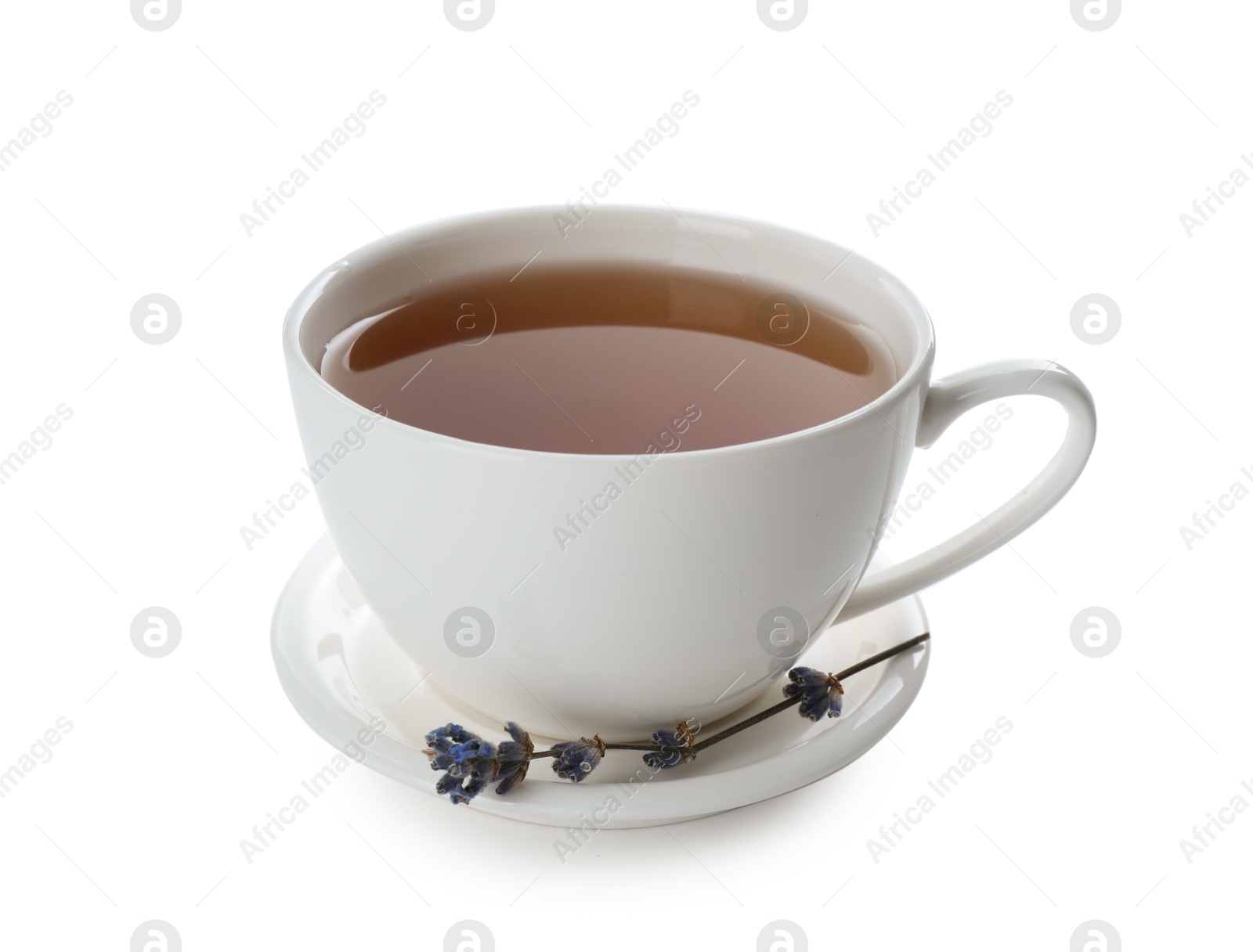 Photo of Aromatic lavender tea in cup and dry flowers isolated on white