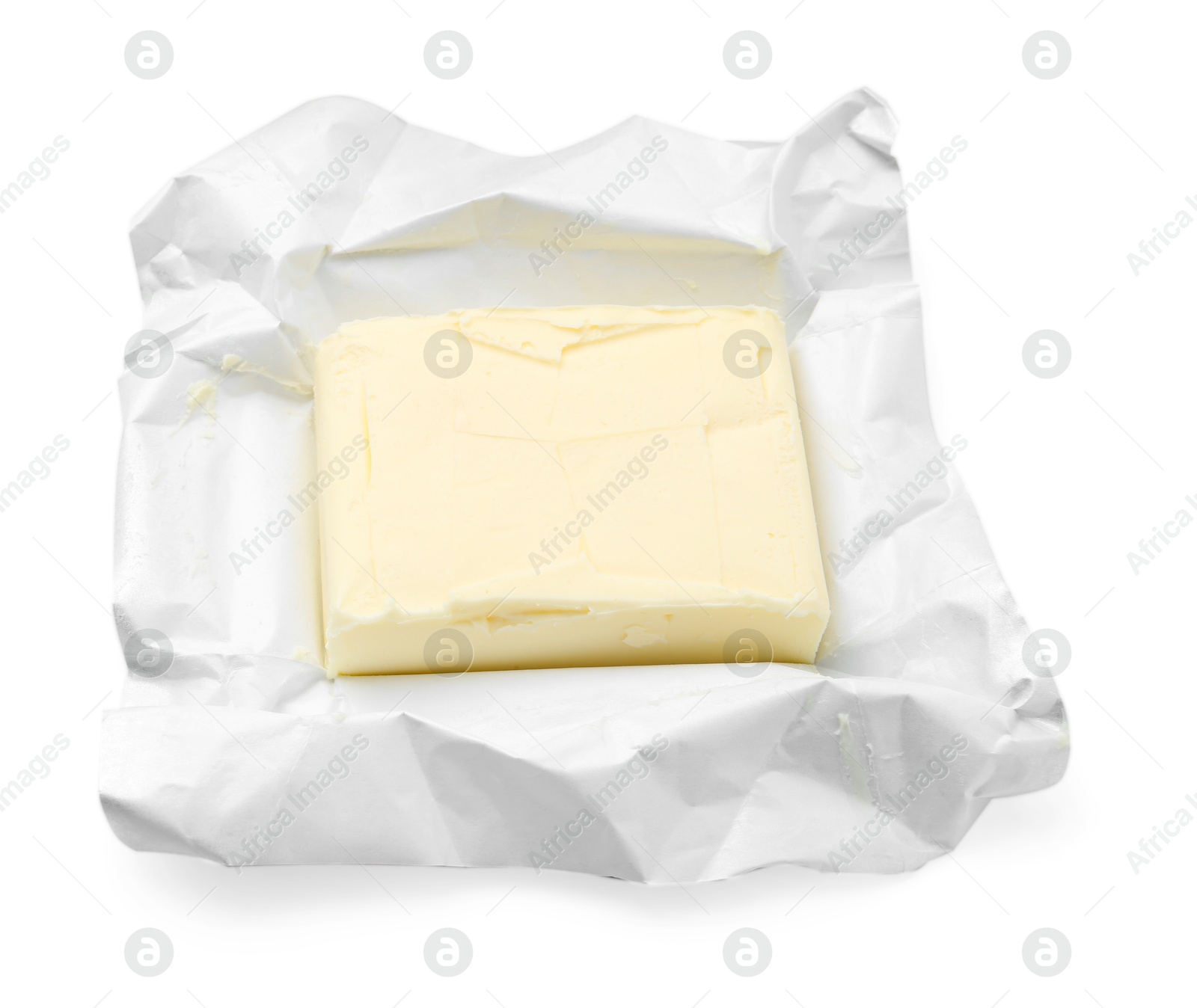 Photo of Block of tasty butter in open package isolated on white