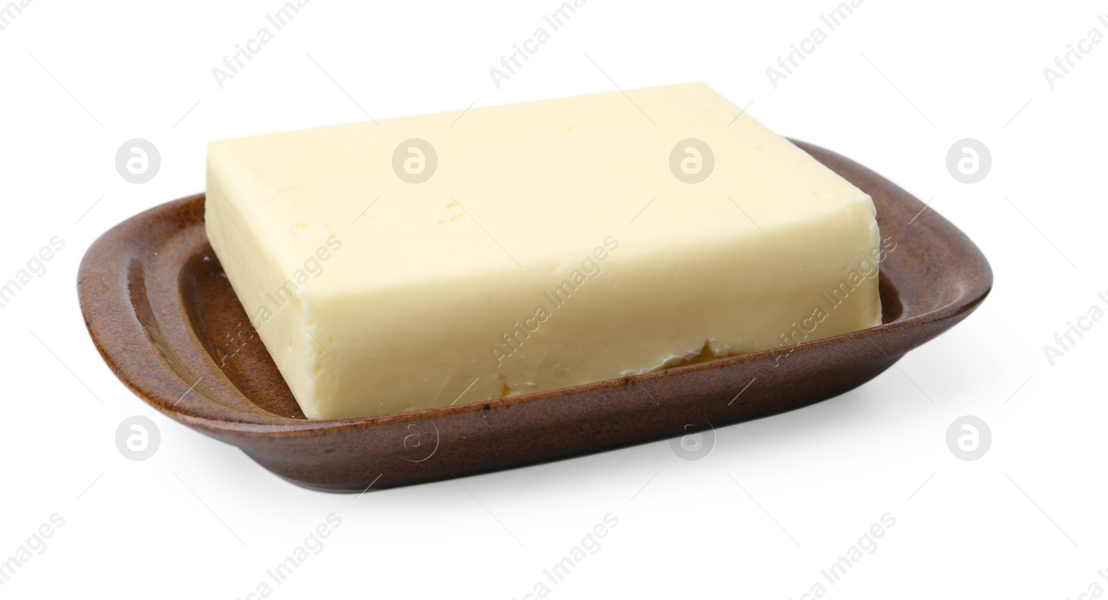 Photo of Block of tasty butter in dish isolated on white