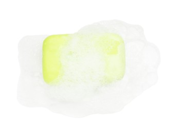 Photo of Green soap with foam on white background, top view