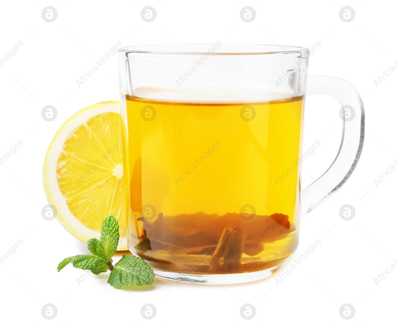 Photo of Aromatic mint tea with lemon, fresh and dried leaves isolated on white