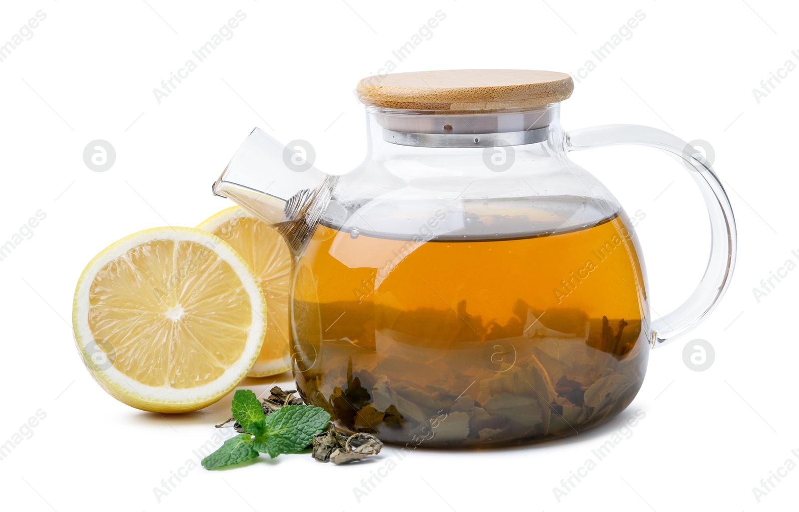 Photo of Aromatic mint tea with lemon, fresh and dried leaves isolated on white