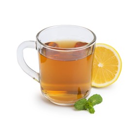 Photo of Tasty mint tea in cup, lemon and fresh leaves isolated on white