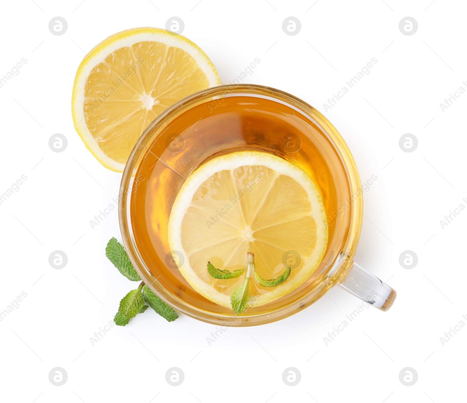 Photo of Tasty mint tea in cup, lemon and fresh leaves isolated on white, top view