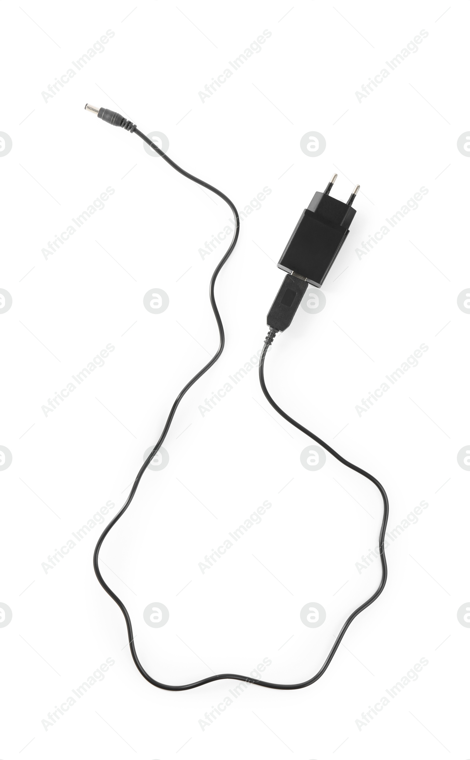 Photo of USB power adapter with charge cable isolated on white, top view