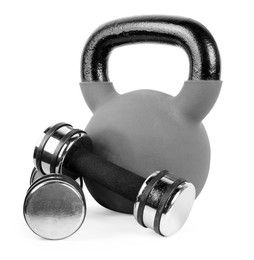 Photo of Metal kettlebell and dumbbells isolated on white