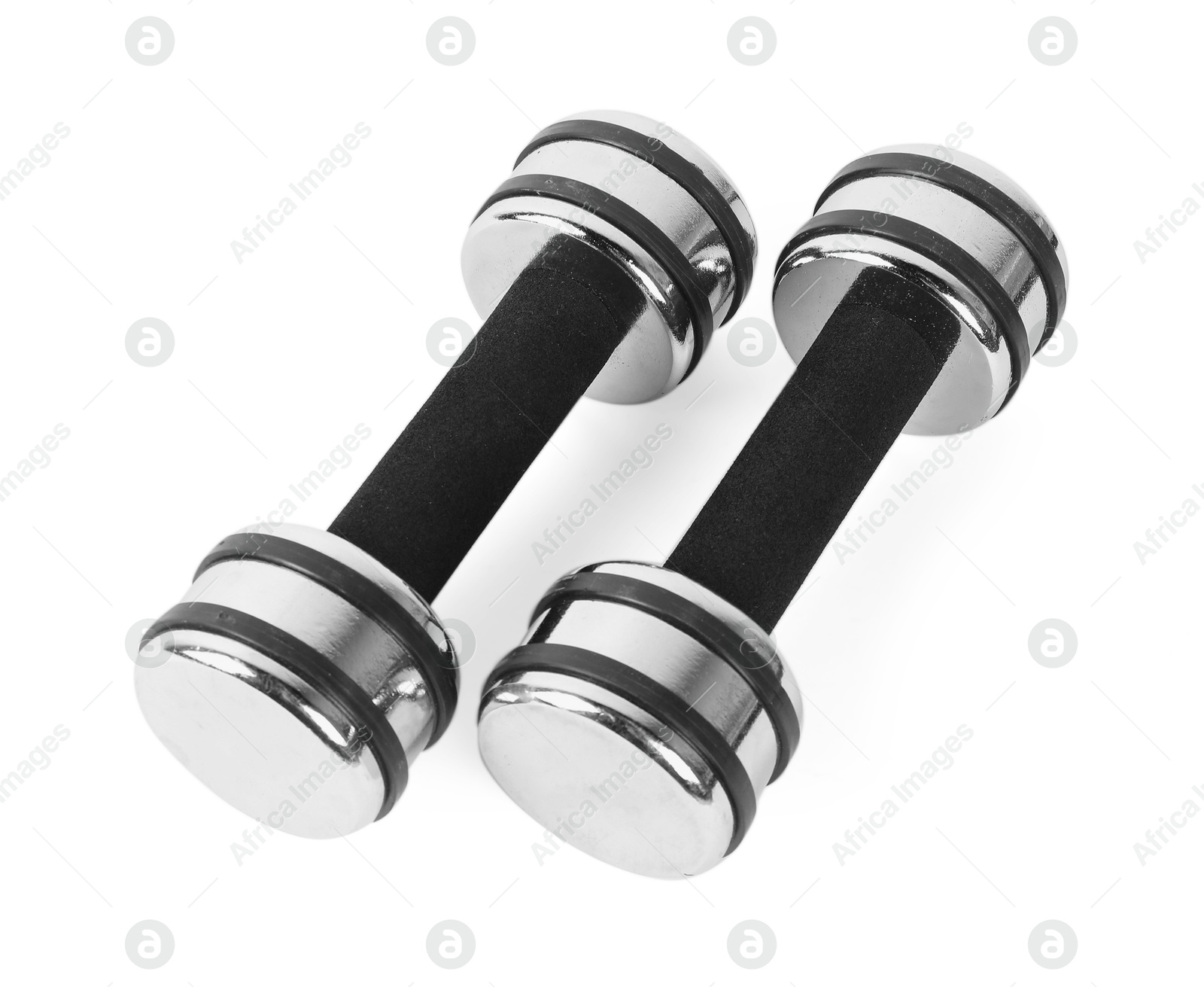 Photo of Two dumbbells isolated on white. Sports equipment