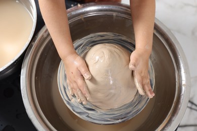 Photo of Hobby and craft. Girl making pottery indoors, above view