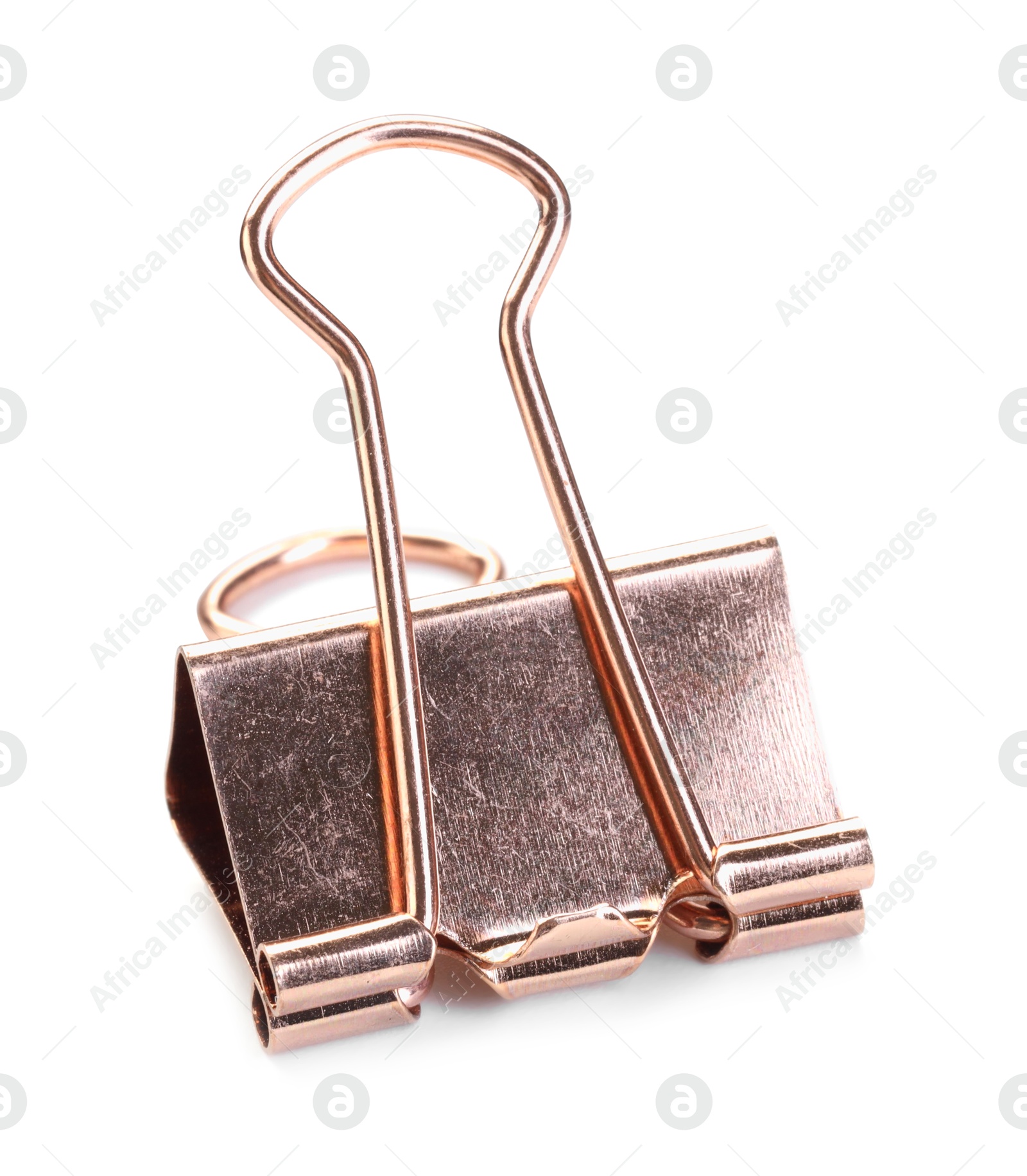 Photo of One golden binder clip isolated on white