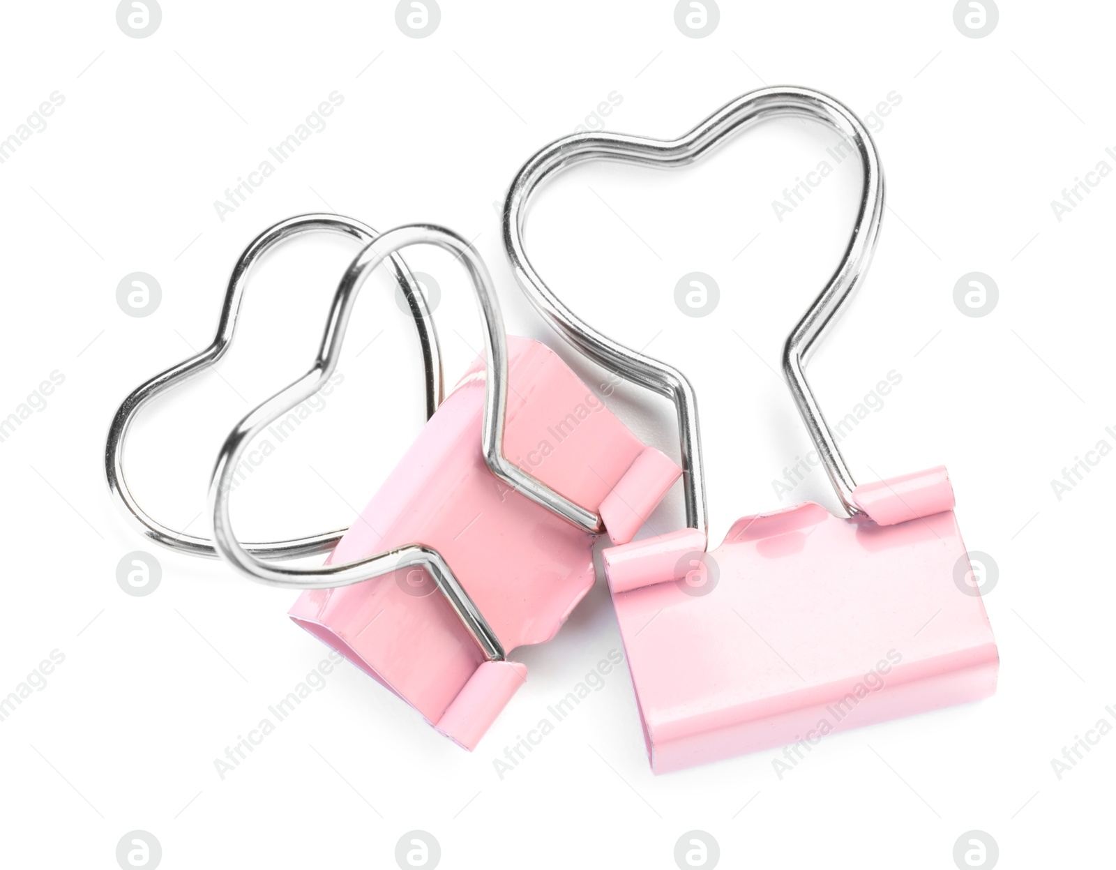 Photo of Heart shaped binder clips isolated on white, top view