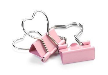 Photo of Heart shaped binder clips isolated on white