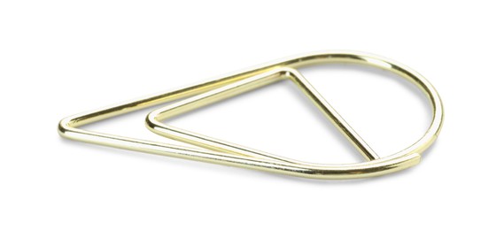 Photo of One golden paper clip isolated on white