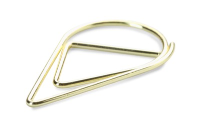 Photo of One golden paper clip isolated on white