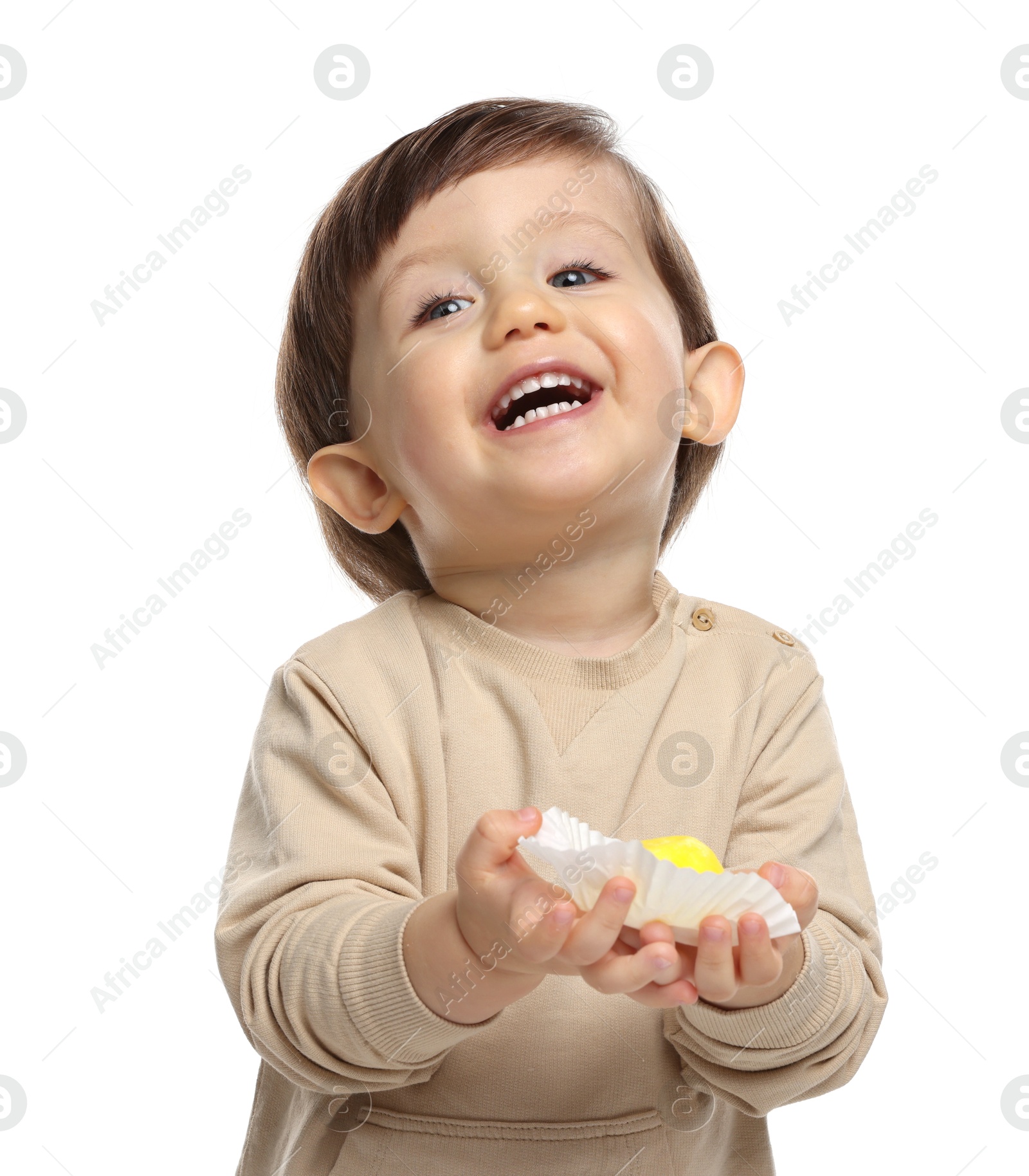 Photo of Cute little child with tasty mochi on white background