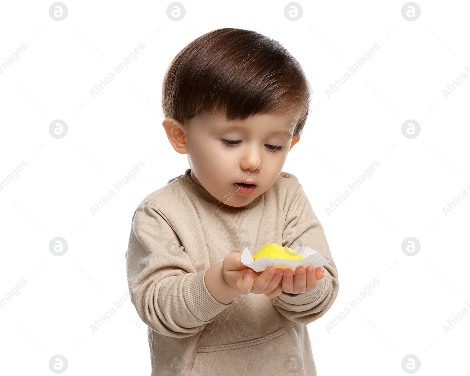 Photo of Cute little child with tasty mochi on white background