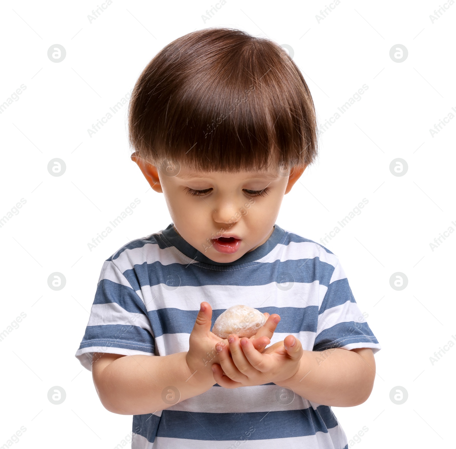 Photo of Cute little child with tasty mochi on white background