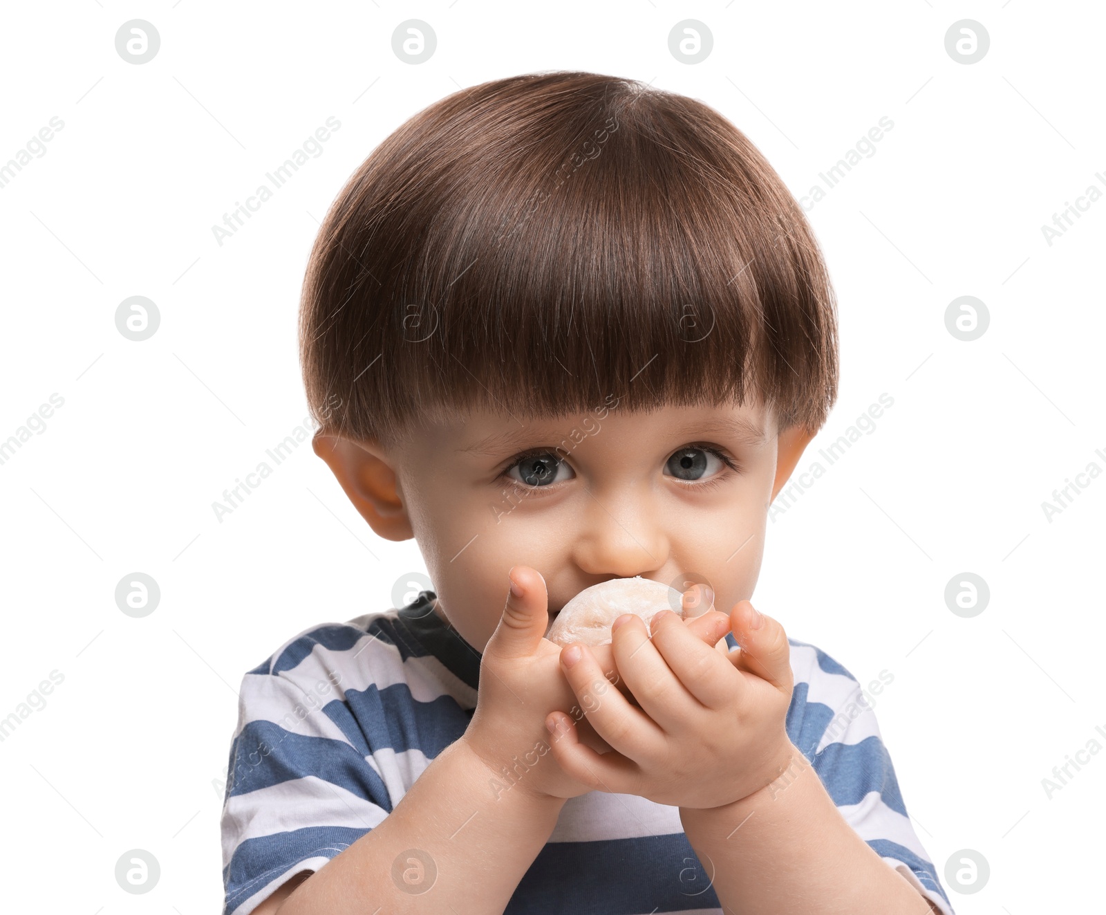 Photo of Cute little child eating tasty mochi on white background