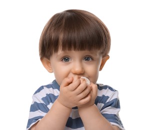 Photo of Cute little child eating tasty mochi on white background