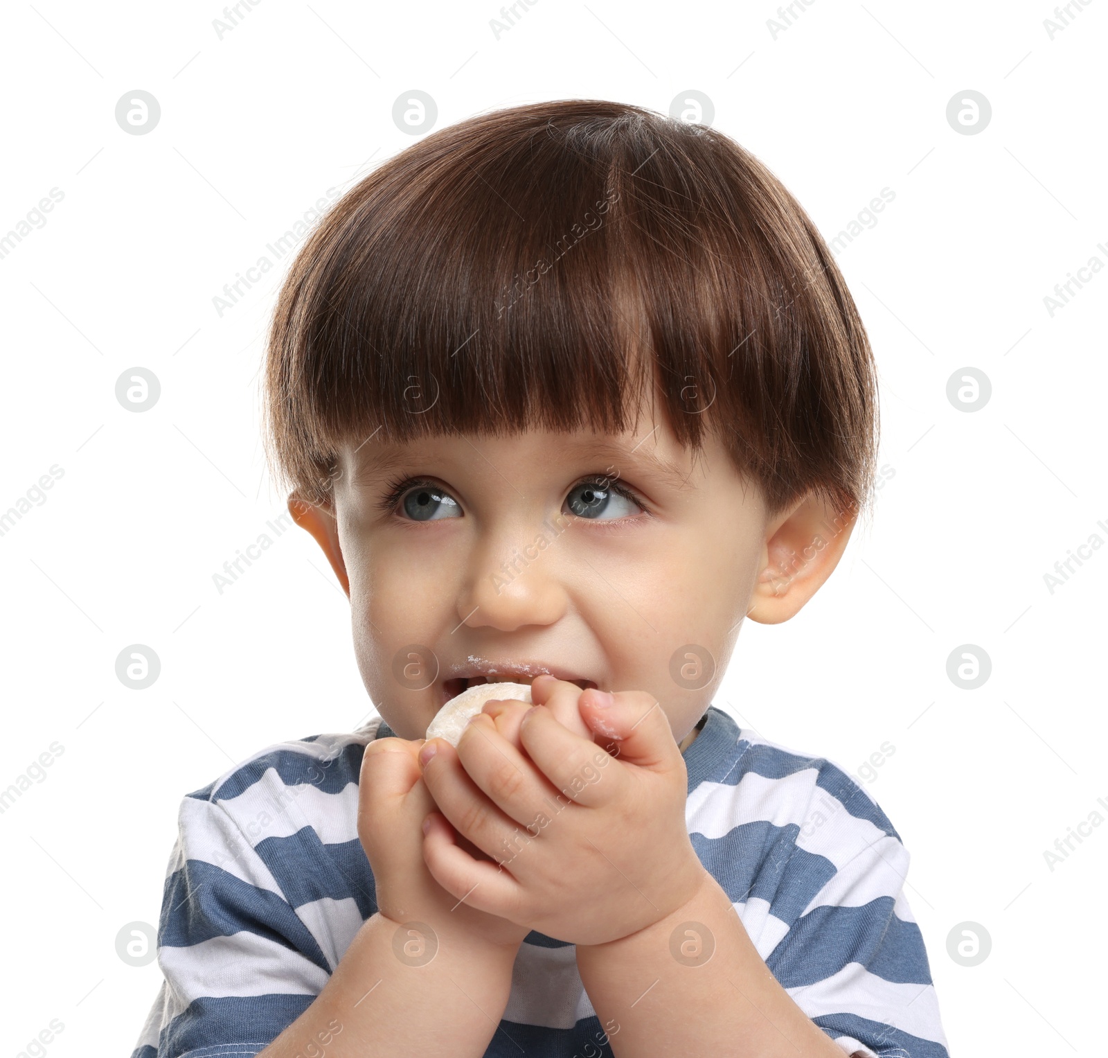 Photo of Cute little child eating tasty mochi on white background