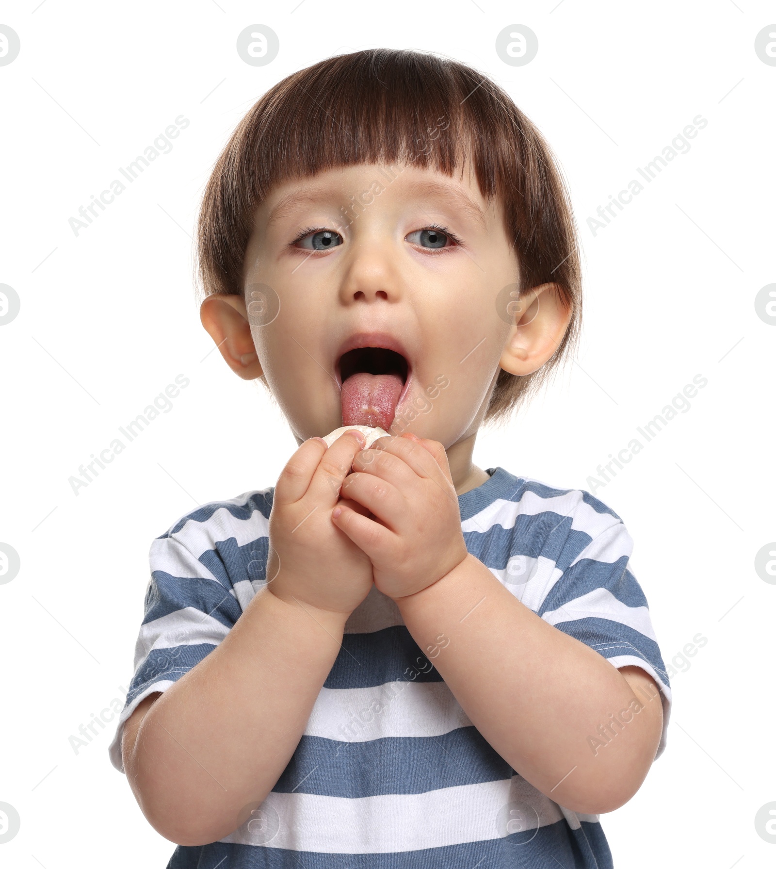 Photo of Cute little child eating tasty mochi on white background