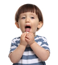 Photo of Cute little child eating tasty mochi on white background