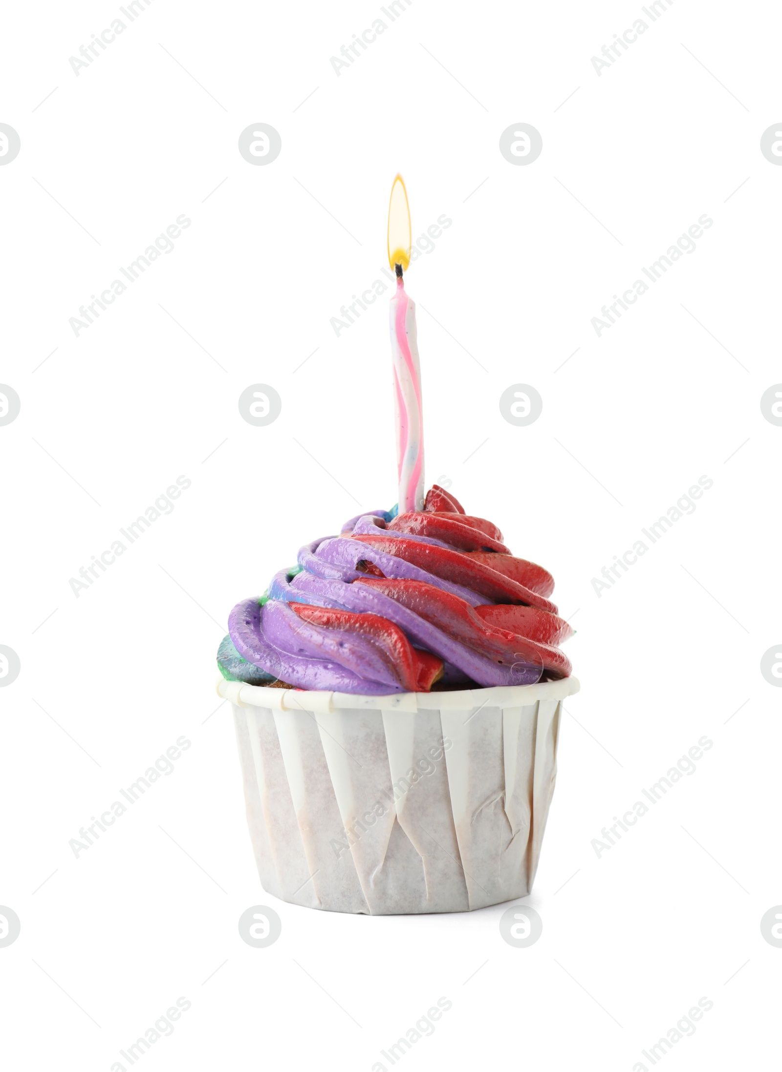 Photo of Delicious cupcake with colorful cream and candle isolated on white