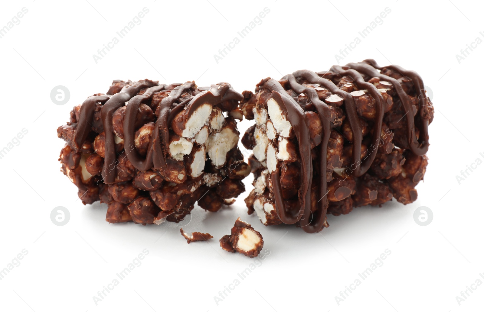 Photo of Pieces of delicious chocolate puffed rice bar isolated on white