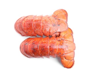 Photo of Tails of boiled lobsters isolated on white, top view